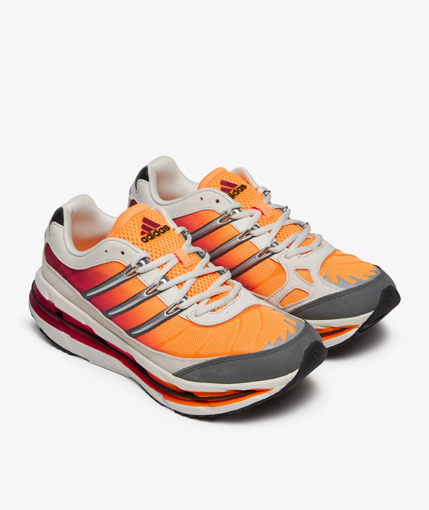 adidas Lawsuit \"Orange アディダス アディダス オリジナルス」の“ロースーツ”のグリーンとオレンジ